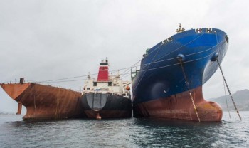 https://www.ajot.com/images/uploads/article/gac-layup-oil-ships-anchored.jpg