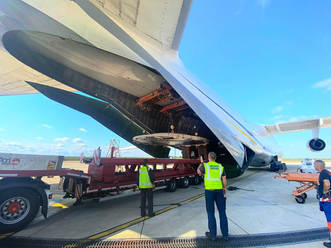 The sections of cargo were loaded and unloaded using the AN-124-100s onboard cranes.