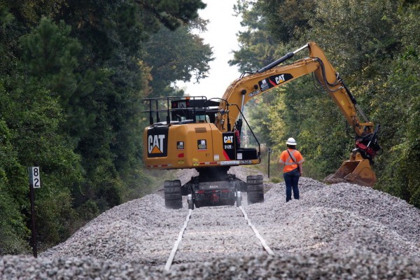 Near Tomball, Texas, 30 miles northwest of Houston, BNSF employees replace ballast in efforts to restore a section of track damaged by flooding from Harvey.