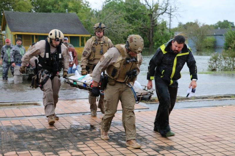 A CBP Air and Marine Operations aircrew from Miami helps evacuate people trapped by flooding caused by Hurricane Harvey in Houston, August 30. Photo Credit: Glenn Fawcett
