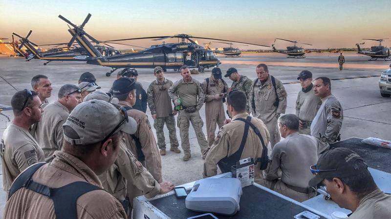 CBP Air and Marine Operations aircrews attend a morning briefing at Kelly Air Force Base in San Antonio prior to starting operations to support Hurricane Harvey relief efforts on August 30. Photo Courtesy of CBP