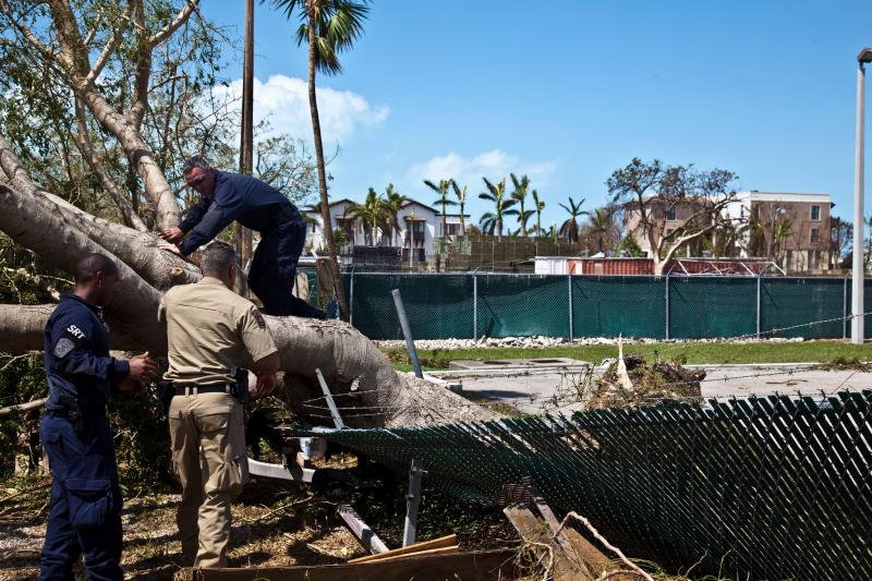 A team of OFO officers and AMO agents assess damage near the Border Patrol Marathon Station, Florida.