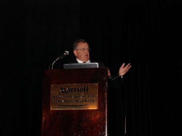 Joe Stratman, executive vice president for raw materials at steel industry leader Nucor Corp., provides the opening keynote address at the Critical Commodities Conference in New Orleans. (Photo by Paul Scott Abbott, AJOT)