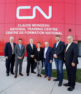 Pictured left to right: Sean Finn, CN executive vice-president corporate services and chief legal officer; Brian Bowman, Mayor of Winnipeg; Luc Jobin, CN president and chief executive officer; Guylaine Mongeau; Claude Mongeau, former CN president and chief executive officer; Daniel Blaikie, MP Transcona; Robert Pace, CN chair of the board.