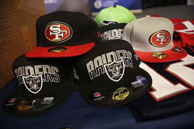 Convincing but not authentic, these Super Bowl hats are fake. Photo Credit: Glenn Fawcett