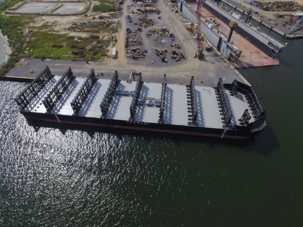 Crowley barge Marty J, recently outfitted to carry containers in this file photo, is among vessels transporting cargo to Puerto Rico after Hurricane Maria.
