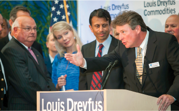 Jay Hardman – Executive Director of the Port of Greater Baton Rouge, (right) speaks at an October 1 dedication ceremony. He is joined by (from the left) Ronnie Anderson – President, Louisiana Farm Bureau Federation; Margarita Louis-Dreyfus – Chairman, Louis Dreyfus Commodities; LA Governor Bobby Jindal