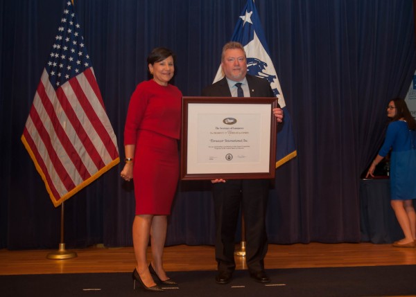 e award John Fornazor and US Secretary of Commerce Penny Pritzer