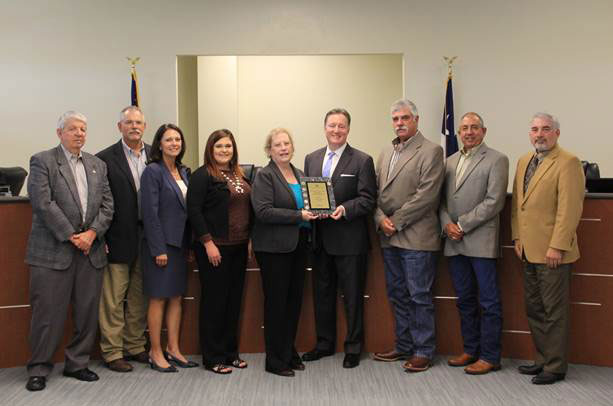 The GFOA Award WAS presented to members of the Accounting and Finance Department by Port Freeport Commissioners and Executive Staff.