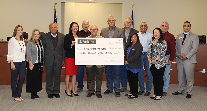 Port Commission and staff presents check to Bobby Fuller, Director of Texas Port Ministry.