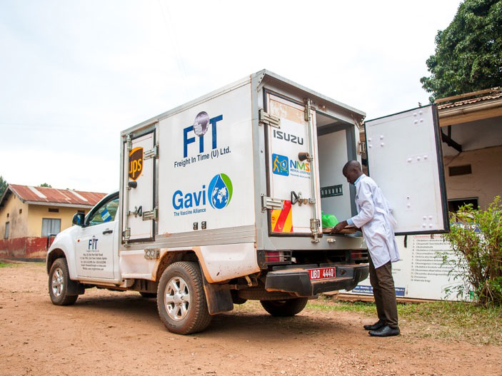 FIT Staff Offloading Vaccines at Buwambo Health Center
