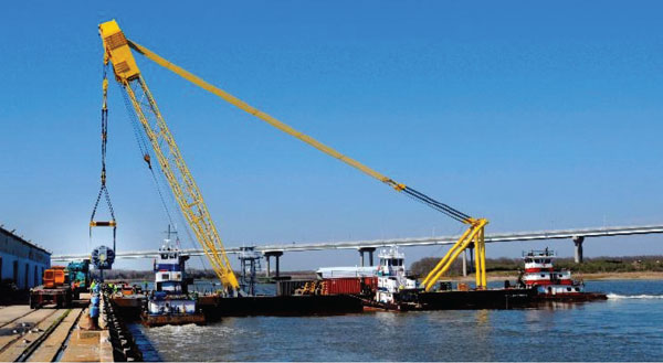 The Ocean Ranger makes its first lift on Sunday, March 2 at Columbus Street. The heavy-lift crane is a fully-mobile barge crane that will service all SCPA terminals. 