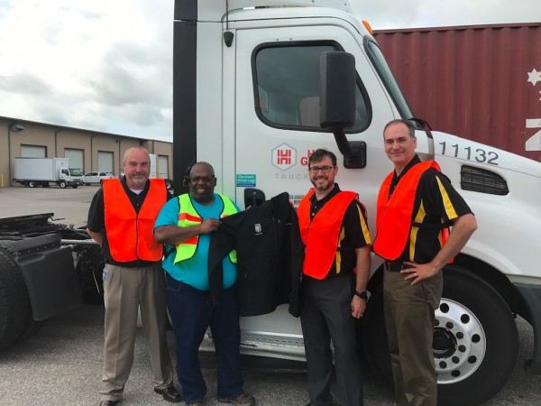 William Pickens receiving recognition for completing the 10 millionth ITI lesson. Pictured (L-R): Don Fields, Memphis Terminal Manager, and William Pickens, Driver of Hub Group Trucking along with Thom Schoenborn, Vice President of Marketing and Nathan Stahlman, COO, both of Instructional Technologies. 