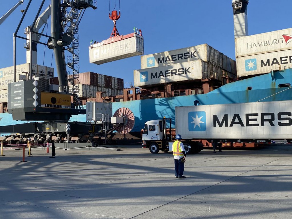 An electric UTR (utility tractor rig, or cargo handling truck), operated by Ceres Terminals, in action at the Port of Hueneme