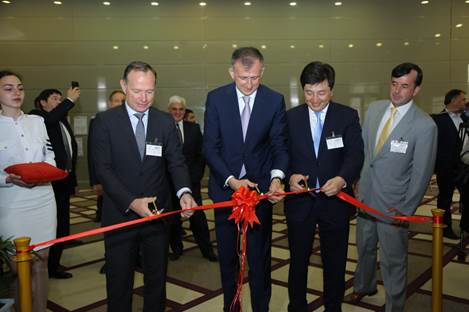At the 6th Black Sea Ports Conference and Exhibit (from left): Hans-Ole Madsen, ICTSI Senior Vice President and Head of EMEA Region, joins Zurab Pataradze, Adjara Autonomous Republic Chairman; Murat Jumadillaye, BSPL Director General; and Rory Doyle, Transport Events Management Managing Director for the ribbon-cutting.
