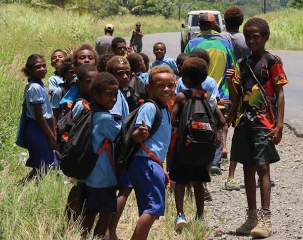 New school bags. On their way to school, Papuan children use their new bags donated by ICTSI South Pacific Ltd., the Company’s Papua New Guinea subsidiary last March.