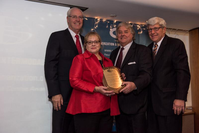 (From left to right) Brendan McCahill, Chairman, CII; Joni Casey, President & CEO, The Intermodal Association of North America and Lifetime Achievement Award recipient; Curtis Whalen, Executive Director, Intermodal Conference at American Trucking Associations and a member of the CII board; and Michael DiVirgilio, President, CII.