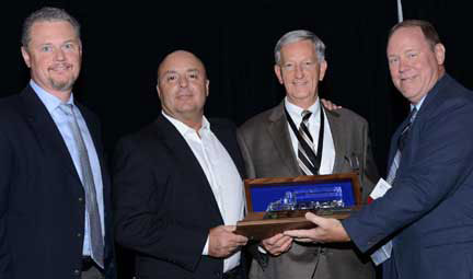 On hand for the award presentation were (from left): Jeff Tanner, vice president, Risk Management, Kenco Management Services; Richard Scott, director, Kenco Transportation Services; Joe Smith, manager, Fleet Safety, Kenco Management Services; Dan Randall, Safety Representative and Loss Control Services, Great West Casualty Insurance Company which sponsored the award.