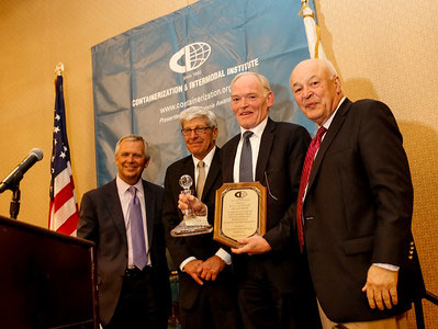 From left: Jon Hemingway, Michael J. DiVirgilio, Knud Stubkjaer and Philip Connors, CII Board member.