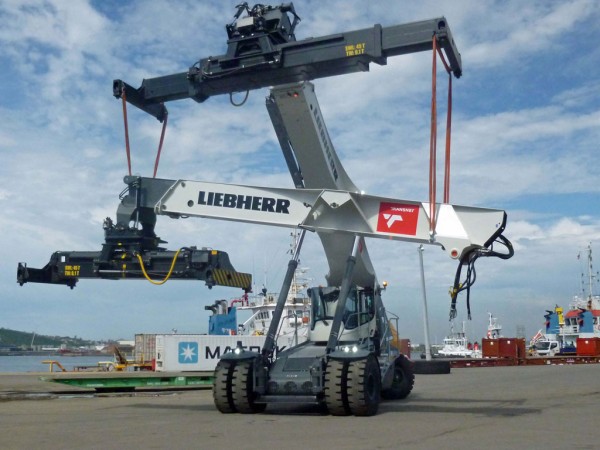 A Liebherr LRS 545 reachstacker assembling its six companions in Durban Port, South Africa.