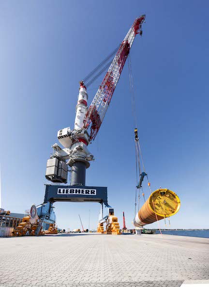 Liebherr TCC 78000 heavy-duty crane loads 72 monopiles for the largest Danish offshore wind farm 