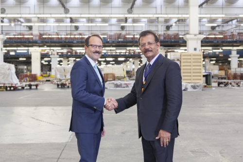 Dr. Karl-Rudolf Rupprecht, Executive Board Member - Operations, Lufthansa Cargo and IBS Software Services Executive Chairman, V K Mathews at the iCAP Switch-over Ceremony held at Lufthansa Cargo Warehouse.