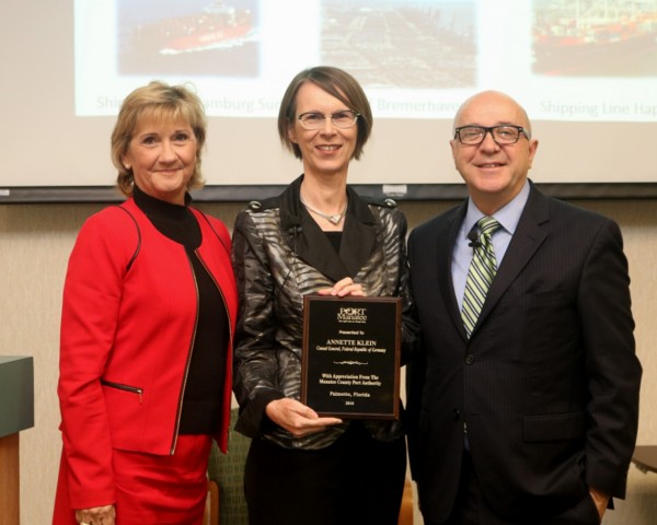 Annette Klein, Germany’s Miami-based consul general, center, is recognized by Vanessa Baugh, chairwoman of the Manatee County Port Authority, left, and Port Manatee Executive Director Carlos Buqueras.