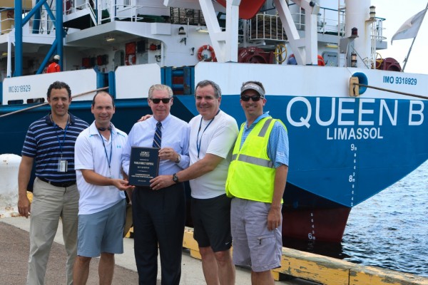 Participants in a ceremony marking the first Port Manatee call of the M.V Queen B are, from left: Carlos Diaz, co-director of World Direct Shipping; Daniel Blazer, principal of World Direct Shipping; Dave Sanford, deputy executive director of Port Manatee; Robert Blazer, principal of World Direct Shipping; and Nate Tooley, co-director of World Direct Shipping.