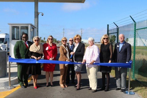 Participants in a Dec. 15 ribbon-cutting ceremony for Port Manatee’s expanded south gate complex include, from left, Charles B. Smith, Manatee County Port Authority; Robin DiSabatino, Manatee County Port Authority; Angelina “Angel” Colonneso, Manatee County Clerk of Circuit Court; Vanessa Baugh, incoming chairwoman of the Manatee County Port Authority; Carlos Buqueras, Port Manatee executive director; Betsy Benac, outgoing chairwoman of the Manatee County Port Authority; Priscilla Whisenant Trace, Manatee County Port Authority; Carol Whitmore, Manatee County Port Authority; and Stephen R. Jonsson, Manatee County Port Authority. 