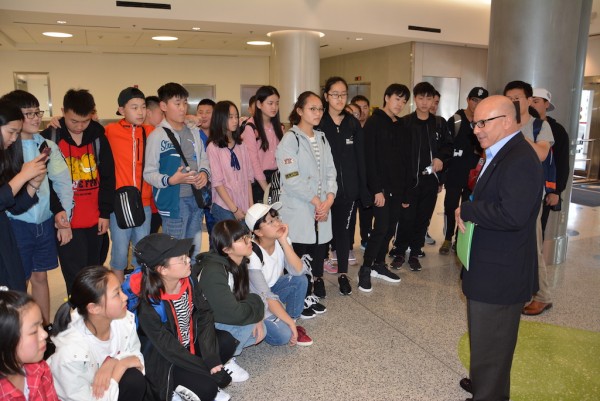 MDAD Chief of Staff Joseph Napoli greets visiting students from Shanghai