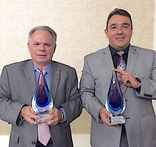 From left: MDAD Assistant Director for Facilities Development Pedro Hernandez and MDAD Civil Environmental Chief Gustavo Leal, with FAC’s 2017 J. Bryan Cooper awards