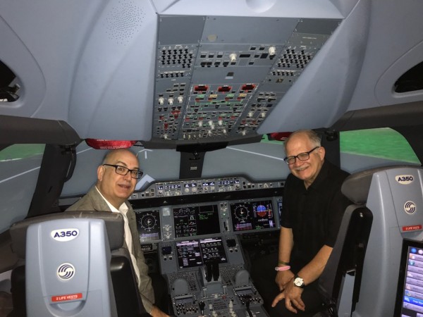 From left: Miami-Dade Aviation Director González (left) and Florida International University President Mark B. Rosenberg, during a recent visit to the Airbus Training Center