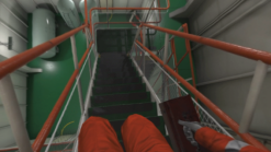 VR screen shows the trainee moving down a stairway on a vessel