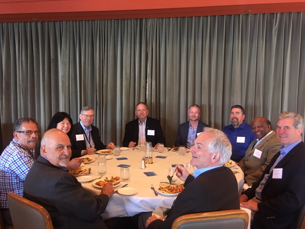 Jerry Moro, second from the left with Port of Oakland executive director, Chris Lytle, fourth from the left, at a Propeller Club of Northern California lunch on April 30th. 