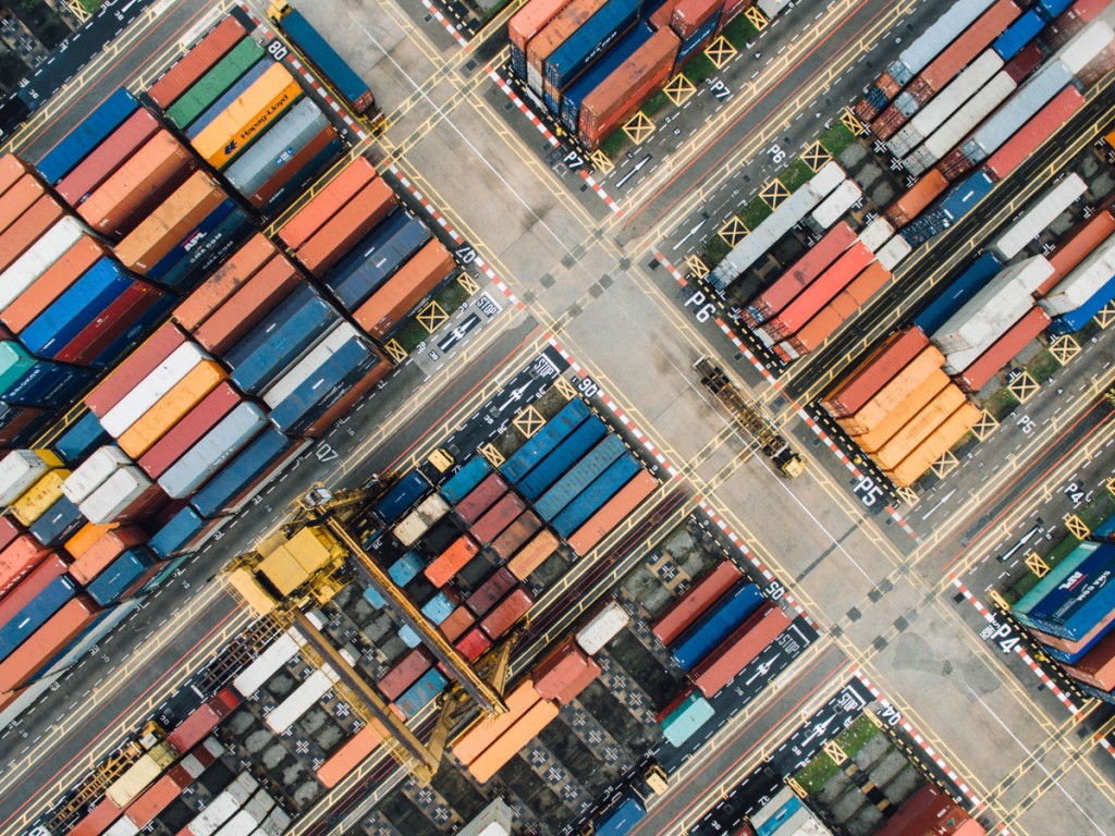 An overhead view of a shipping dock, representing key benefits CRM systems provide.