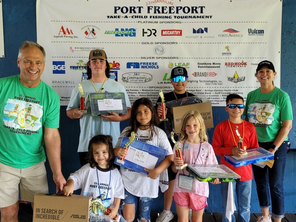 Port Freeport Executive Director/CEO Phyllis Saathoff and Port Commissioner Rob Giesecke present 1st place through 3rd place awards to tournament winners in blue fins and yellow fins divisions.