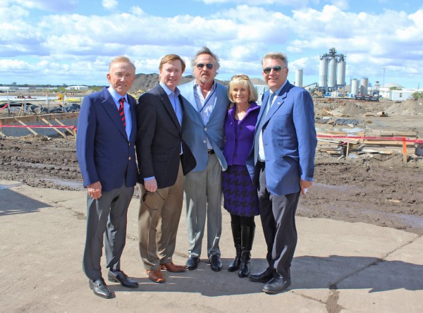Ribbon cutting of new facility and attendees. Tampa developer/project investor Richard Corbett; Agriculture Commissioner Adam Putnam; Port Chairman Steve Swindal; Port Commissioner/Hillsborough County Commissioner Sandy Murman; and Port President/CEO Paul Anderson stand before the construction site. 