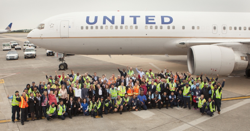 United employees, many of whom have worked for the company at Washington Dulles International Airport for over 30 years, gathered together on Monday to celebrate the airline's 30th anniversary of serving the airport as a hub. (PRNewsFoto/United Airlines)