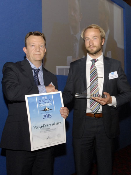 Pierre Van Der Stichele (left), Director Business Development - Cargo of Chapman Freeborn Airchartering presents the award to Georgy Sokolov, Regional Sales Manager of Volga-Dnepr Airlines. (Photo by Colin Antill)