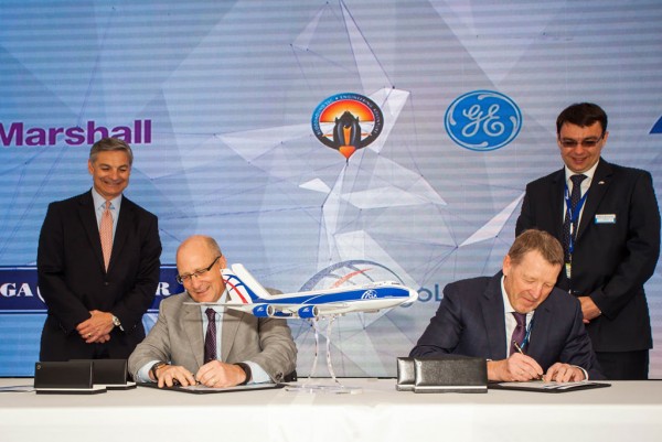 GE's David Joyce (seated left) and Alexey Isaikin of Volga-Dnepr Group signing the strategic agreement at Farnborough Airshow today.